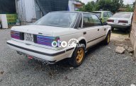 Nissan Bluebird 1984 - Bán Nissan Bluebird sản xuất 1984, màu trắng, nhập khẩu nguyên chiếc giá 20 triệu tại Tiền Giang