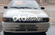 Mazda 323 1996 - Cần bán lại xe Mazda 323 2.0MT sản xuất 1996, màu trắng, xe nhập giá 23 triệu tại Nam Định