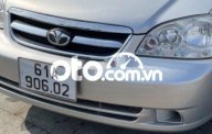 Daewoo Lacetti SE 2009 - Cần bán Daewoo Lacetti SE sản xuất năm 2009, màu bạc giá 155 triệu tại Bình Dương