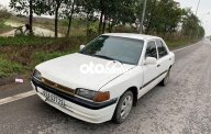 Mazda 323 1994 - Xe Mazda 323 2.0MT sản xuất năm 1994, màu trắng, xe nhập giá 25 triệu tại Hà Nội