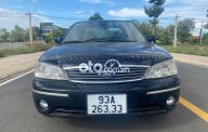 Ford Laser 1.6MT 2003 - Xe Ford Laser 1.6MT sản xuất 2003, màu đen chính chủ giá 140 triệu tại Bình Phước