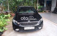 Kia Cerato 2017 - Bán Kia Cerato 1.6MT năm sản xuất 2017, màu đen xe gia đình  giá 400 triệu tại Tiền Giang