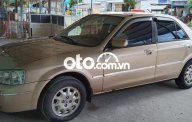 Ford Laser 2001 - Màu vàng, nhập khẩu nguyên chiếc giá 115 triệu tại Kiên Giang