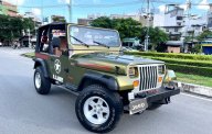 Jeep Wrangler 1996 - Nhập Mỹ, số sàn 2 cầu hàng hiếm. Xe giấy tờ zin, có máy lạnh, bao không hao xăng, chạy 100km/10 lít giá 590 triệu tại Tp.HCM