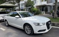 Audi A6 Cần bán   2012 màu trắng form mới 2012 - Cần bán Audi A6 2012 màu trắng form mới giá 620 triệu tại Tp.HCM