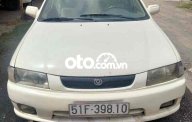 Mazda 323 cần bán lại xe tập lái   2001 - cần bán lại xe tập lái mazda 323 giá 60 triệu tại Tp.HCM