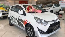 Bán Toyota Wigo 1.2G MT sản xuất năm 2022, màu trắng, nhập khẩu giá 330 triệu tại Tp.HCM