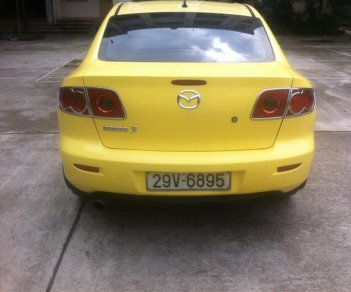Mazda 3 1.6AT 2005 - Bán xe Mazda 3 1.6AT đời 2005, màu vàng, xe nhập, chính chủ