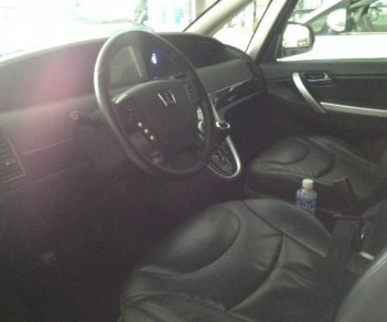 Luxgen M7 2010 - Cần bán xe Luxgen M7 sản xuất 2010, màu bạc, xe nhập số tự động