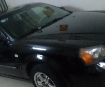 Daewoo Magnus  AT 2004 - Bán xe Daewoo Magnus AT đời 2004, màu đen, giá chỉ 260 triệu