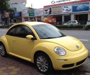 Volkswagen New Beetle    AT 2009 - Cần bán lại xe Volkswagen New Beetle AT 2009, màu vàng, nhập khẩu