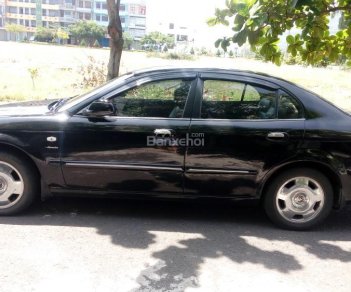 Daewoo Magnus 2004 - Cần bán xe Daewoo Magnus đời 2004, màu đen, nhập khẩu