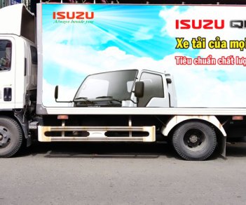 Isuzu NMR 2011 - Bán xe Isuzu NMR đời 2011, màu trắng. Có tải nâng, điều hòa, DVD
