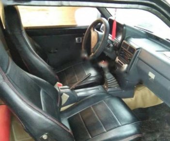 Mazda 323 1990 - Cần bán Mazda 323 đời 1990, màu đen, nhập khẩu, giá 57tr