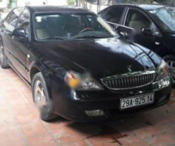 Daewoo Magnus 2004 - Cần bán lại xe Daewoo Magnus 2004, màu đen, nhập khẩu nguyên chiếc, giá 200tr