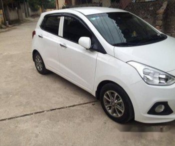 Hyundai i10  MT 2014 - Chính chủ bán Hyundai i10 MT 2014, màu trắng