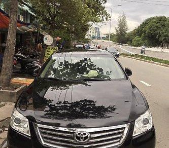 Toyota Camry 2.4G 2011 - Cần bán gấp Toyota Camry 2.4G sản xuất 2011, màu đen chính chủ