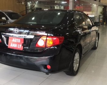 Toyota Corolla altis MT  2011 - Bán Toyota Corolla altis MT sản xuất 2011, màu đen