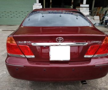 Toyota Camry 3.0AT 2005 - Cần bán gấp Toyota Camry 3.0AT đời 2005, màu đỏ xe gia đình