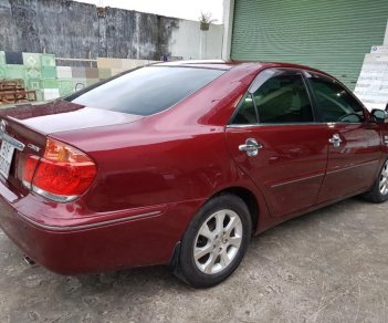 Toyota Camry 3.0AT 2005 - Cần bán gấp Toyota Camry 3.0AT đời 2005, màu đỏ xe gia đình