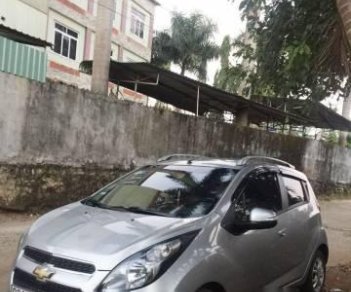 Chevrolet Spark   LTZ 1.0AT 2015 - Bán Chevrolet Spark LTZ 1.0AT đời 2015, màu bạc số tự động