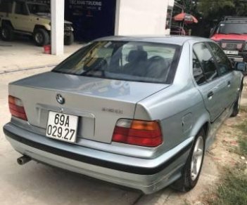 BMW 3 Series  320i  1998 - Bán ô tô BMW 3 Series 320i sản xuất 1998, màu bạc, giá chỉ 115 triệu