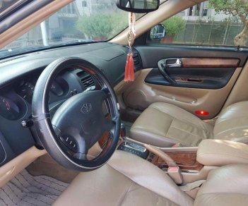 Daewoo Magnus 2004 - Cần bán gấp Daewoo Magnus đời 2004, màu đen, xe nhập, giá chỉ 145 triệu