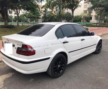 BMW 3 Series 318i 2005 - Cần bán xe BMW 3 Series 318i năm 2005, màu trắng xe gia đình