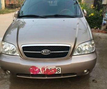 Kia Carnival 2009 - Bán Kia Carnival 2009, màu vàng  