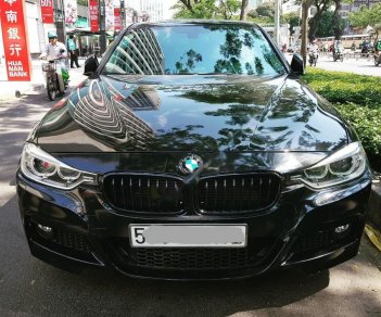 BMW 3 Series 320i 2014 - Bán xe BMW 3 Series 320i đời 2014, màu đen, xe nhập 