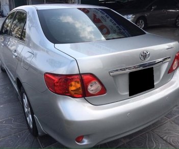 Toyota Corolla altis 1.8AT 2009 - Cần bán xe Toyota Corolla Altis 1.8AT 2009, màu xám bạc