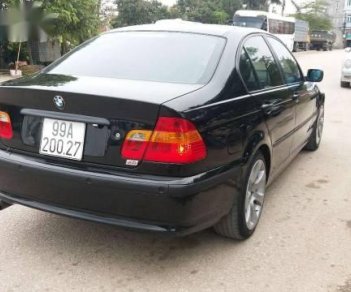 BMW 3 Series  318i  2002 - Bán xe BMW 3 Series 318i sản xuất 2002, màu đen  