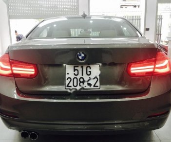 BMW 3 Series 320i 2015 - Cần bán xe BMW 3 Series 320i 2015, màu nâu, xe nhập như mới