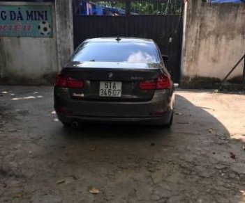 BMW 3 Series 320i 2012 - Bán xe BMW 3 Series 320i sản xuất 2012, màu nâu