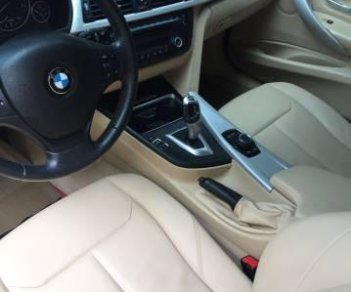BMW 3 Series  320i  2014 - Chính chủ bán xe BMW 3 Series 320i sản xuất 2014, màu đen
