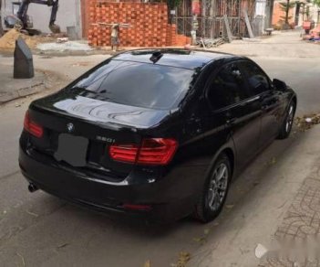 BMW 3 Series  320i  2014 - Chính chủ bán xe BMW 3 Series 320i sản xuất 2014, màu đen