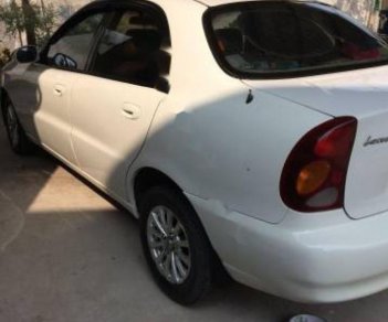 Daewoo Lanos 2002 - Cần bán gấp Daewoo Lanos đời 2002, màu trắng