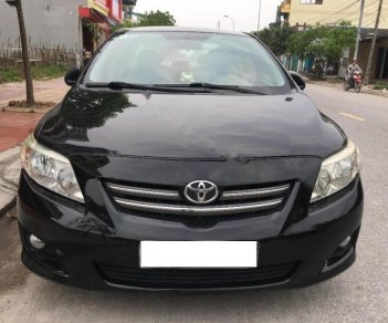 Toyota Corolla altis 1.8G MT 2009 - Bán Toyota Corolla altis 1.8G MT đời 2009, màu đen chính chủ giá cạnh tranh