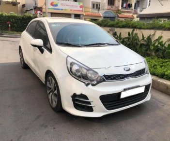 Kia Rio 1.4 AT 2015 - Bán Kia Rio 1.4 AT đời 2015, màu trắng, nhập khẩu số tự động