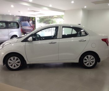 Hyundai Grand i10 1.2 MT Base 2018 - Cần bán xe Hyundai Grand i10 Sedan base sản xuất 2018, màu vàng, 350tr