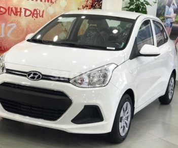 Hyundai Grand i10 1.2 MT Base 2018 - Cần bán xe Hyundai Grand i10 Sedan base sản xuất 2018, màu vàng, 350tr