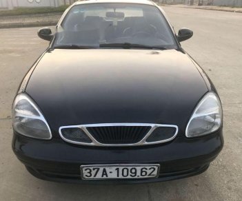 Daewoo Nubira  1.6  2001 - Cần bán Daewoo Nubira 1.6 sản xuất 2001, màu đen, 75 triệu