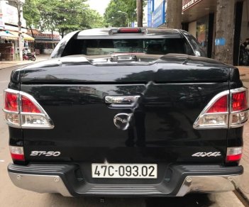 Mazda BT 50 3.2L 4x4 AT 2015 - Cần bán Mazda BT 50 3.2L 4x4 AT sản xuất 2015, màu đen, xe nhập còn mới