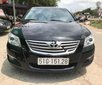 Toyota Camry 2.4G 2007 - Bán Toyota Camry 2.4 G 2007, màu đen số tự động, giá chỉ 570 triệu