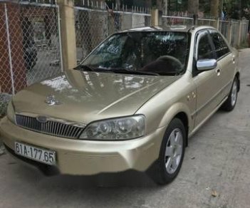 Ford Laser 2003 - Bán Ford Laser năm 2003, màu vàng đồng, giá tốt