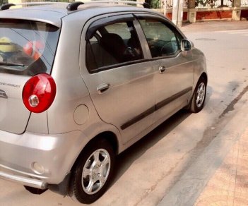 Chevrolet Spark LT 2009 - Cần bán xe Chevrolet Spark LT đời 2009, màu bạc. Xe 5 chỗ biển Hà Nội tên chính chủ