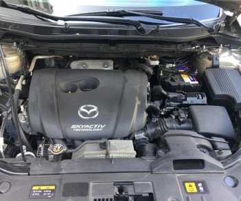 Mazda CX 5 2.0 AT AWD 2015 - Cần bán lại xe Mazda CX 5 2.0 AT AWD năm sản xuất 2015, màu ghi vàng
