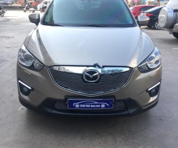 Mazda CX 5 2.0 AT AWD 2015 - Cần bán lại xe Mazda CX 5 2.0 AT AWD năm sản xuất 2015, màu ghi vàng