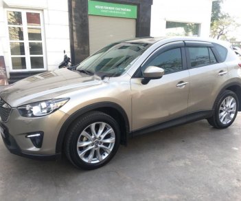 Mazda CX 5 2.0 AT AWD 2015 - Cần bán lại xe Mazda CX 5 2.0 AT AWD năm sản xuất 2015, màu ghi vàng