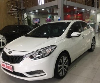 Kia K3 2014 - Cần bán gấp Kia K3 sản xuất 2014, màu trắng số sàn, giá tốt